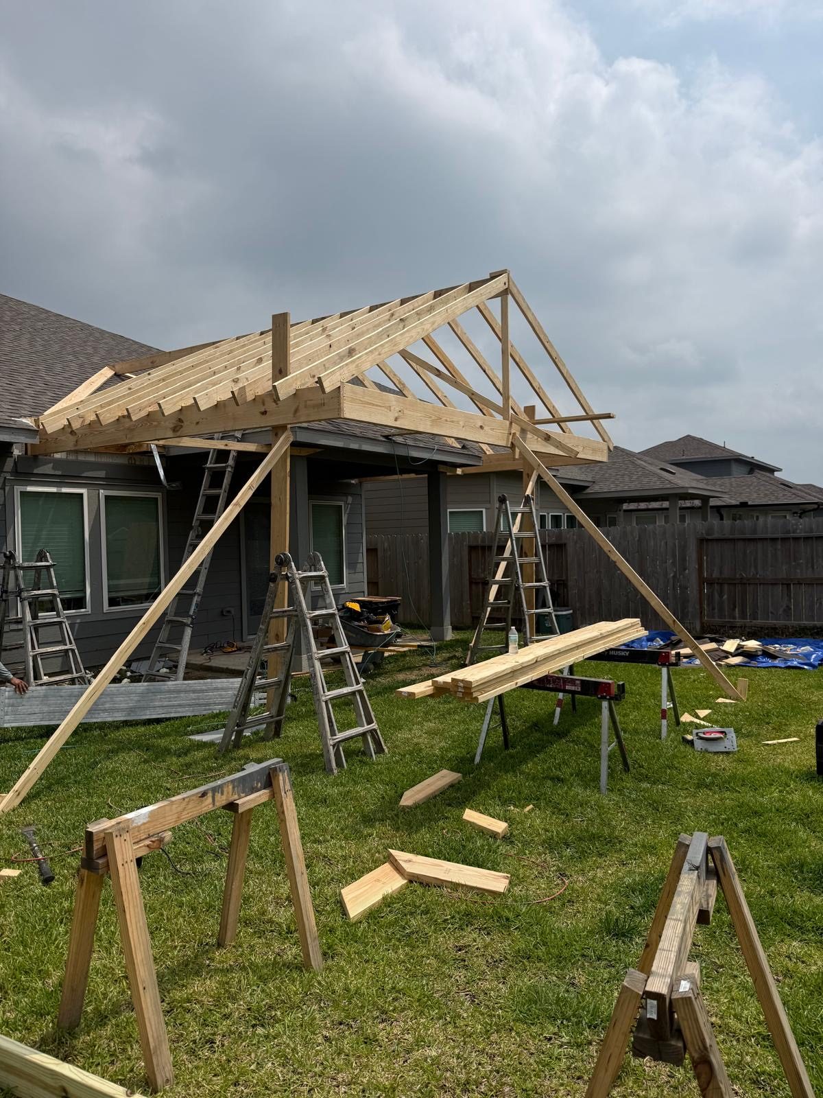 Patio cover roof framing under construction